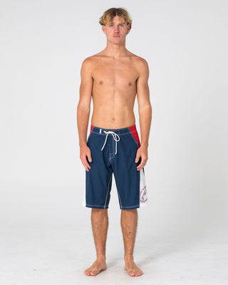 Man wearing Sandglass Fixed Waist Boardshort in Navy Blue