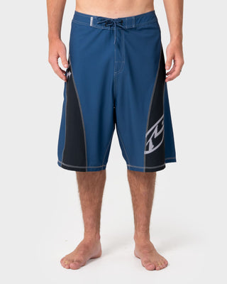 Man wearing Tribalay Fixed Waist Boardshort in Atlantic Blue