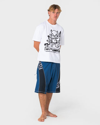 Man wearing Tribalay Fixed Waist Boardshort in Atlantic Blue