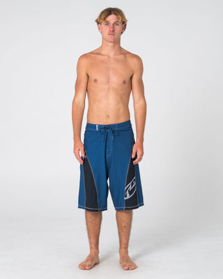 Man wearing Tribalay Fixed Waist Boardshort in Atlantic Blue