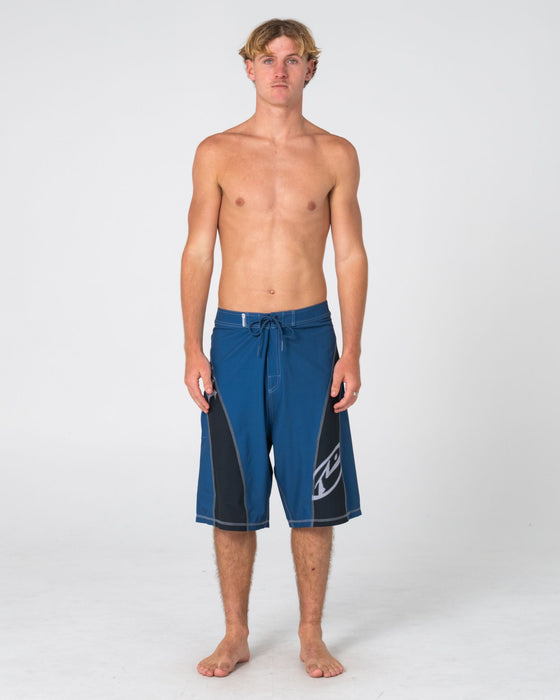man-wearing-tribalay-fixed-waist-boardshort-in-atlantic-blue
