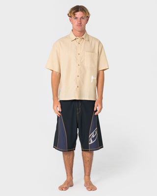 Man wearing Tribalay Fixed Waist Boardshort in Black