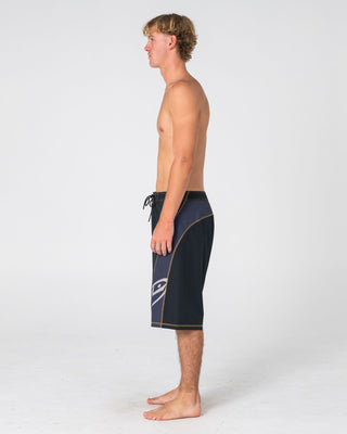 Man wearing Tribalay Fixed Waist Boardshort in Black