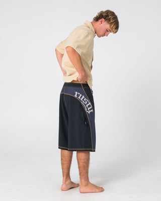 Man wearing Tribalay Fixed Waist Boardshort in Black