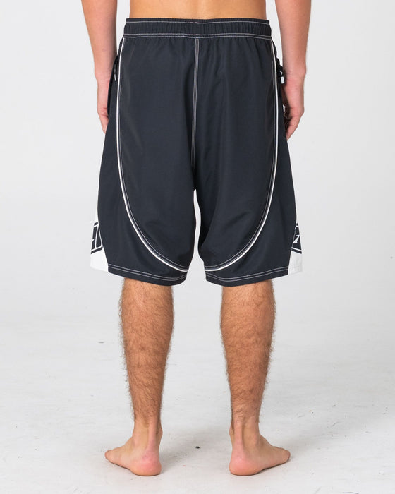 man-wearing-deathroll-hybrid-waist-boardshort-in-black