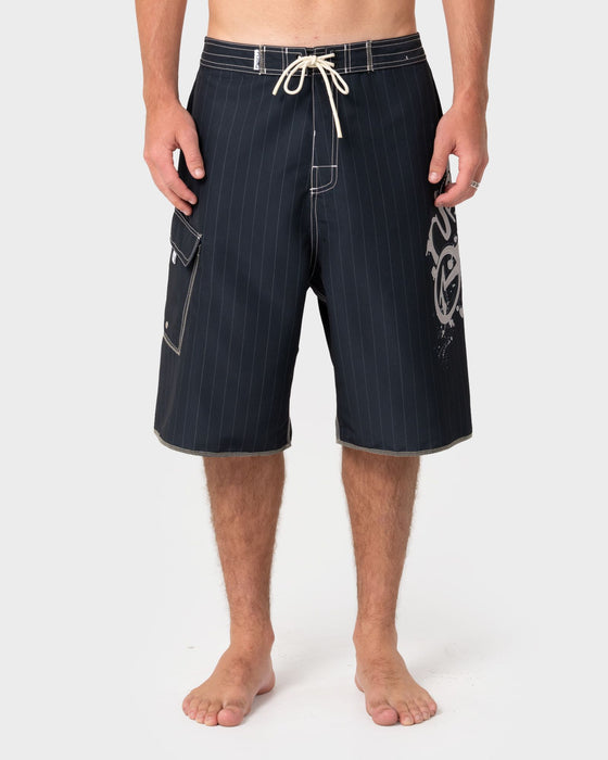 man-wearing-scribbla-fixed-waist-boardshort-in-black