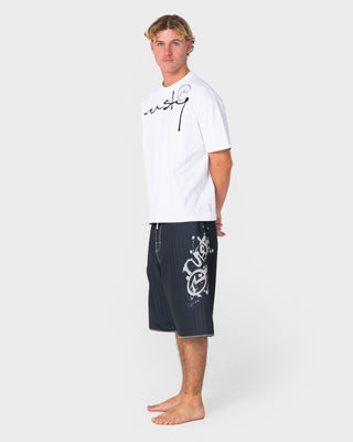 Man wearing Scribbla Fixed Waist Boardshort in Black