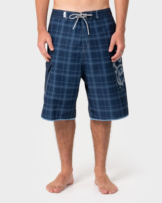 man-wearing-scribbla-fixed-waist-boardshort-in-navy-blue