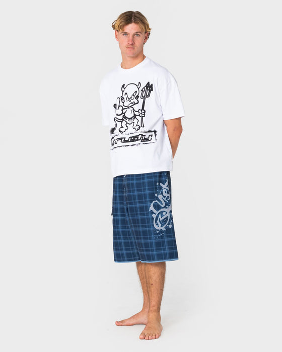 man-wearing-scribbla-fixed-waist-boardshort-in-navy-blue
