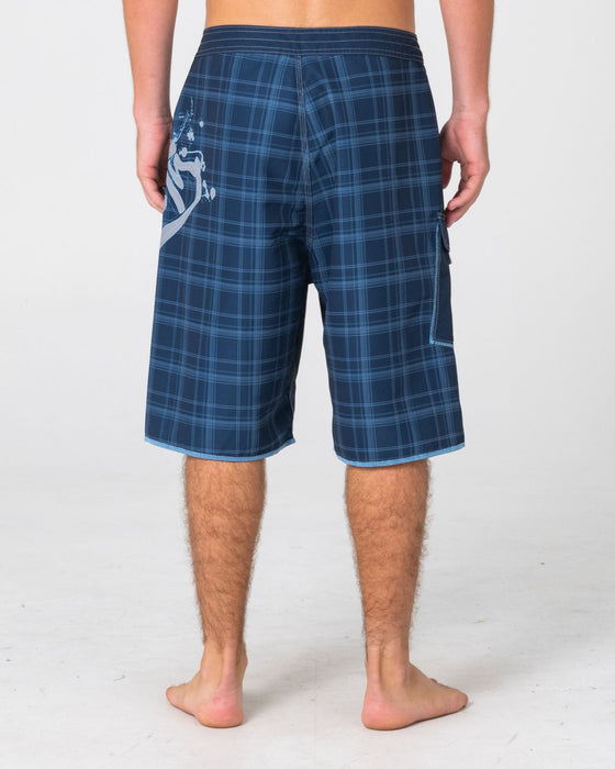 man-wearing-scribbla-fixed-waist-boardshort-in-navy-blue