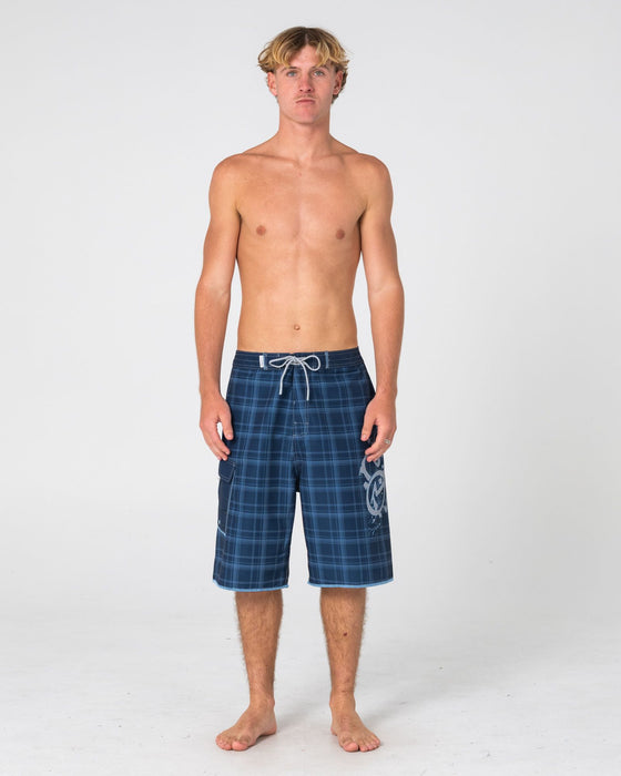 man-wearing-scribbla-fixed-waist-boardshort-in-navy-blue