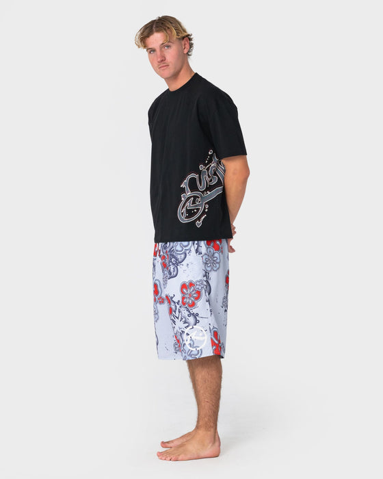 man-wearing-rambo-elastic-waist-boardshort-in-stone-grey