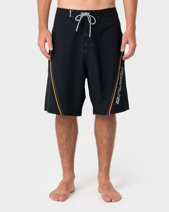 man-wearing-saber-tooth-fixed-waist-boardshort-in-black