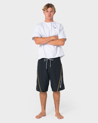 Man wearing Saber Tooth Fixed Waist Boardshort in Black