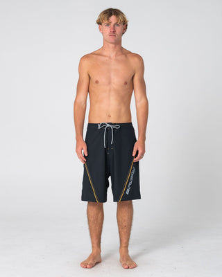 Man wearing Saber Tooth Fixed Waist Boardshort in Black