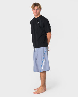 Man wearing Saber Tooth Fixed Waist Boardshort in Stone Grey