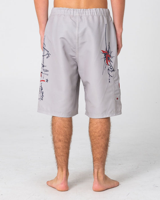 man-wearing-crisis-hybrid-waist-boardshort-in-abbey-stone
