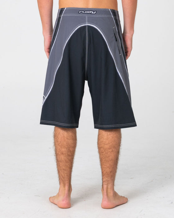 man-wearing-refract-fixed-waist-boardshort-in-black