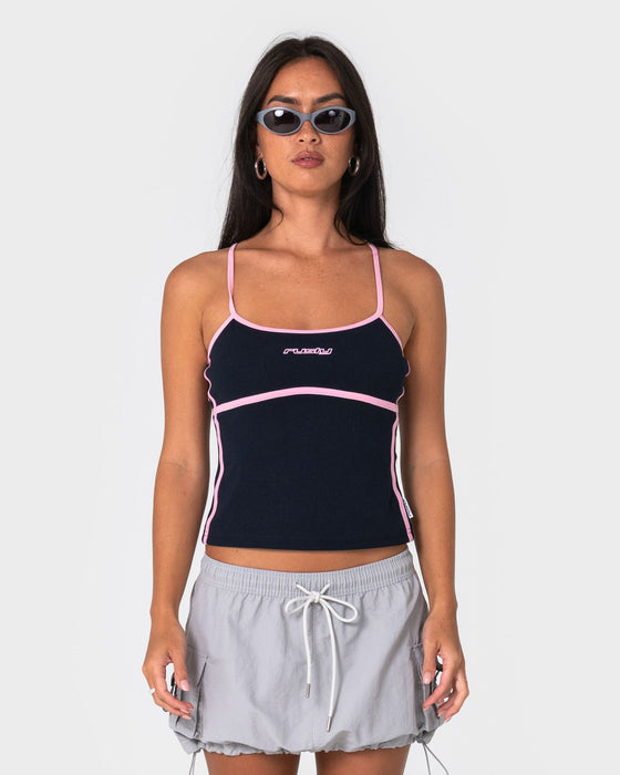 woman-wearing-freo-king-fitted-top-in-navy-blue-pink