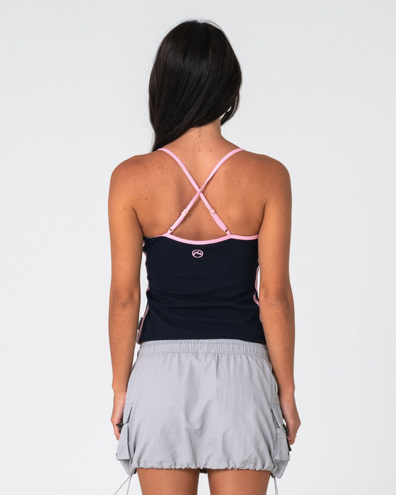 woman-wearing-freo-king-fitted-top-in-navy-blue-pink