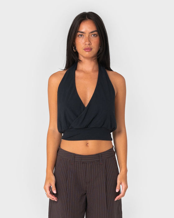 woman-wearing-honey-halter-top-in-black
