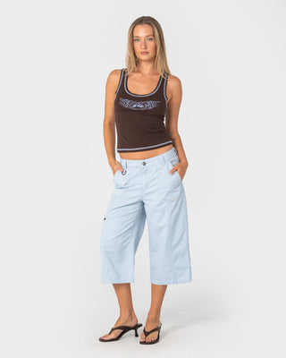Woman wearing It Gyrl Low Rise Capri Cargo Pant in Pastel Blue