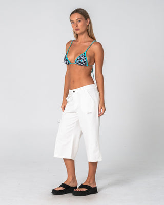 Woman wearing It Gyrl Low Rise Capri Cargo Pant in White