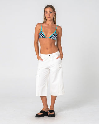 Woman wearing It Gyrl Low Rise Capri Cargo Pant in White