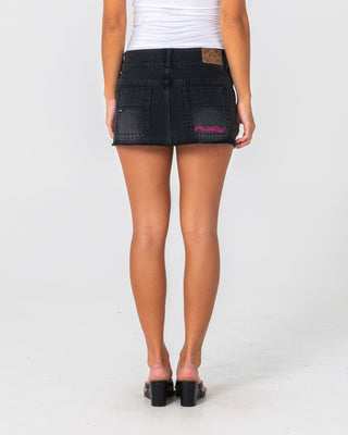 Woman wearing Chaos Low Rise Micro Mini Skirt in Blasted Black