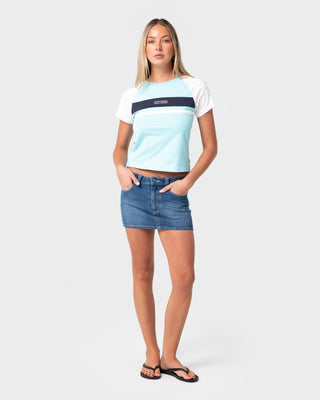 Woman wearing Flip Mommy Low Rise Mini Denim Skirt 2.0 in Blasted Middy Blue / Blue