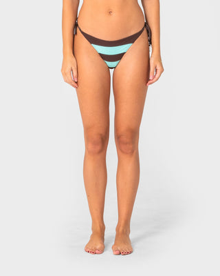 Woman wearing Rack City Brazilian Tie Bikini Bottom in Aqua