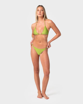 woman-wearing-shadow-ring-cheeky-bikini-bottom-in-sublime-green