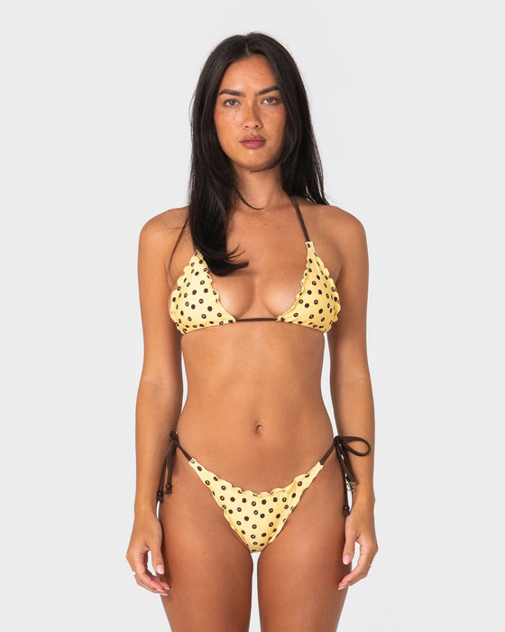 woman-wearing-miss-dot-tri-bikini-top-in-pale-banana-java