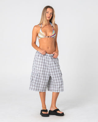 Woman wearing Barbara Stripeson Multiway Bikini Top in Pastel Stripe
