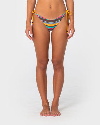 Woman wearing Barbara Stripeson Midi Bikini Bottom in Barbara Stripe