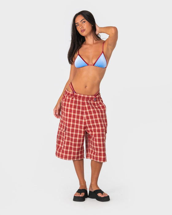 woman-wearing-sugary-sliding-tri-bikini-top-in-cornflour-blue-red
