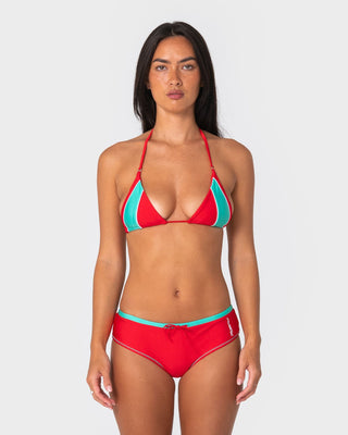Woman wearing Voltron Tri Bikini Top in Tomato / Aqua