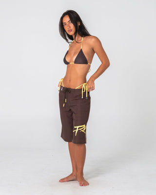 Woman wearing Cyberpunk Multiway Bikini Top in Pinecone / Yellow