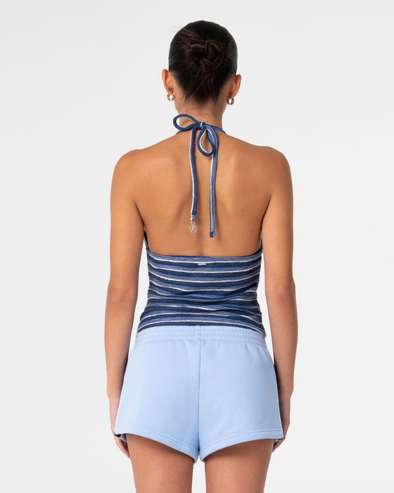 woman-wearing-emma-cut-out-skimmer-tank-in-blue-stripe