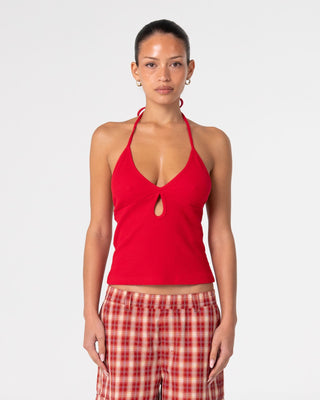 Woman wearing Emma Cut Out Skimmer Tank in Red 2