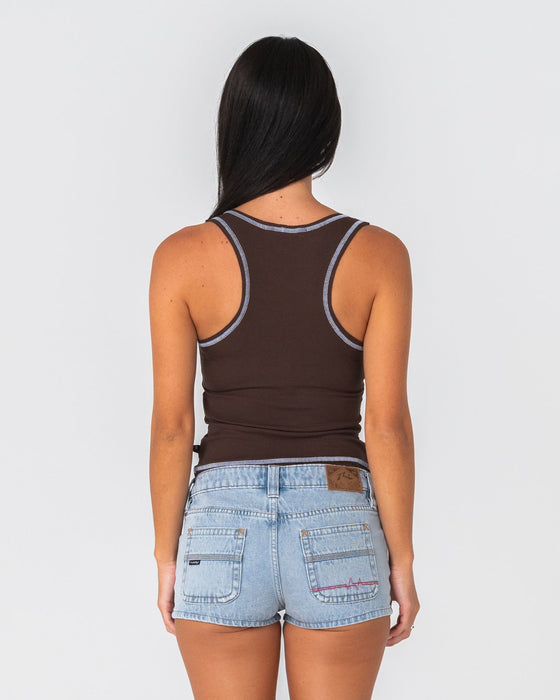 woman-wearing-dirrty-racer-tank-in-java-retro-blue
