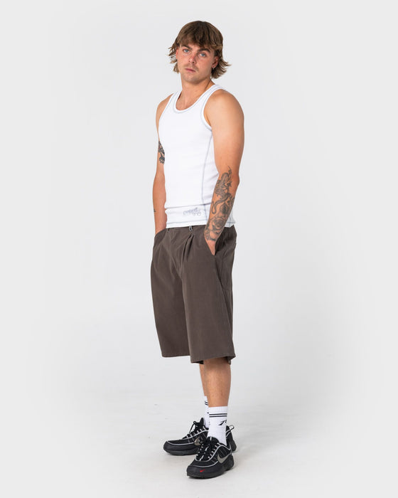 man-wearing-slack-jack-ribbed-heavy-tank-in-white
