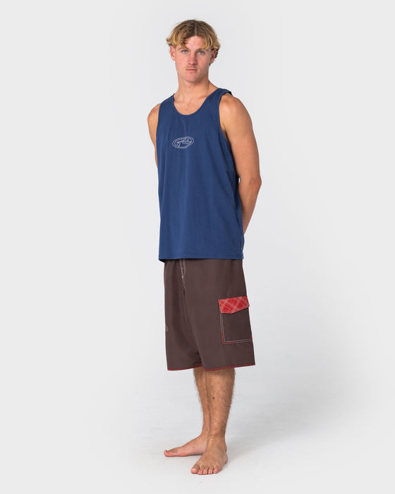 man-wearing-clarence-tank-in-dark-blue