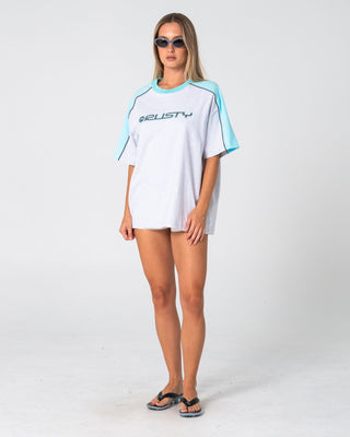 Woman wearing Timmy Target 220 Oversize Tee in Ecru Marle / Aqua