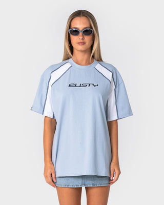 Woman wearing Wavers Tide Oversize Short Sleeve Tee in Retro Blue / White