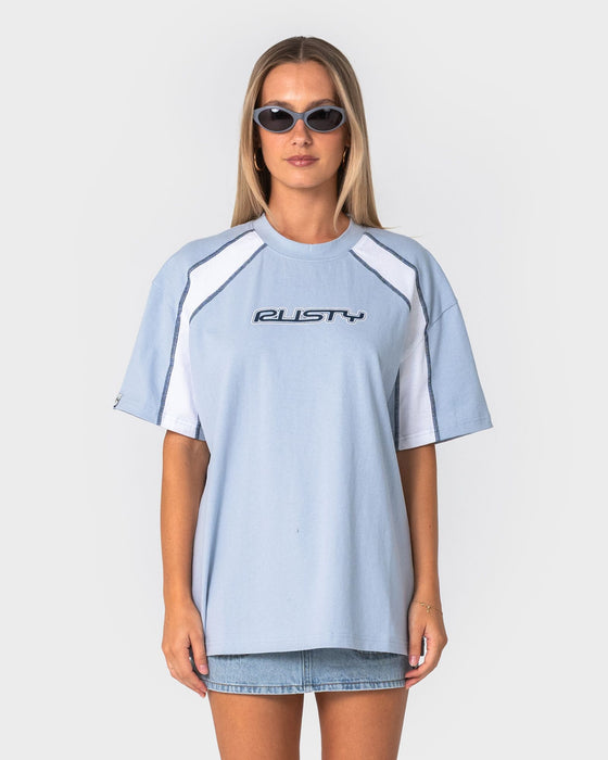 woman-wearing-wavers-tide-oversize-short-sleeve-tee-in-retro-blue-white
