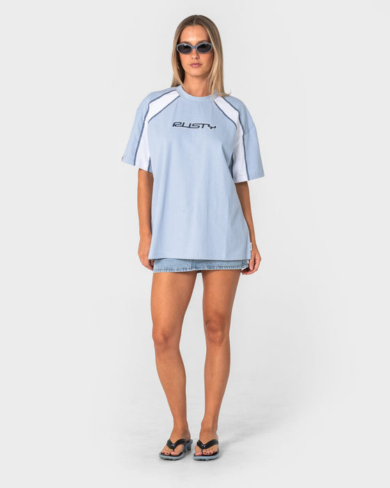 woman-wearing-wavers-tide-oversize-short-sleeve-tee-in-retro-blue-white