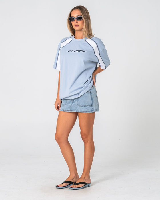 woman-wearing-wavers-tide-oversize-short-sleeve-tee-in-retro-blue-white