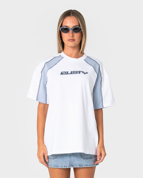 woman-wearing-wavers-tide-oversize-short-sleeve-tee-in-white-retro-blue