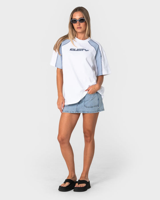 woman-wearing-wavers-tide-oversize-short-sleeve-tee-in-white-retro-blue